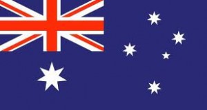 Australian flag, dark blue background, white stars and a red union jack