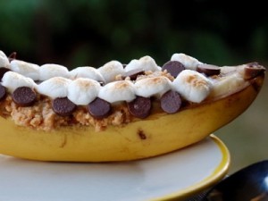 ripe yellow banana with marshmellows and chocolate chips inside