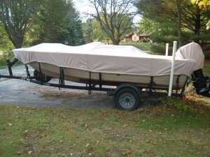 Beige Boat Cover Tied Down