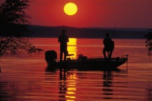 two men fishing in a boat